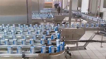 Sistem Conveyor untuk Industri Produk Susu